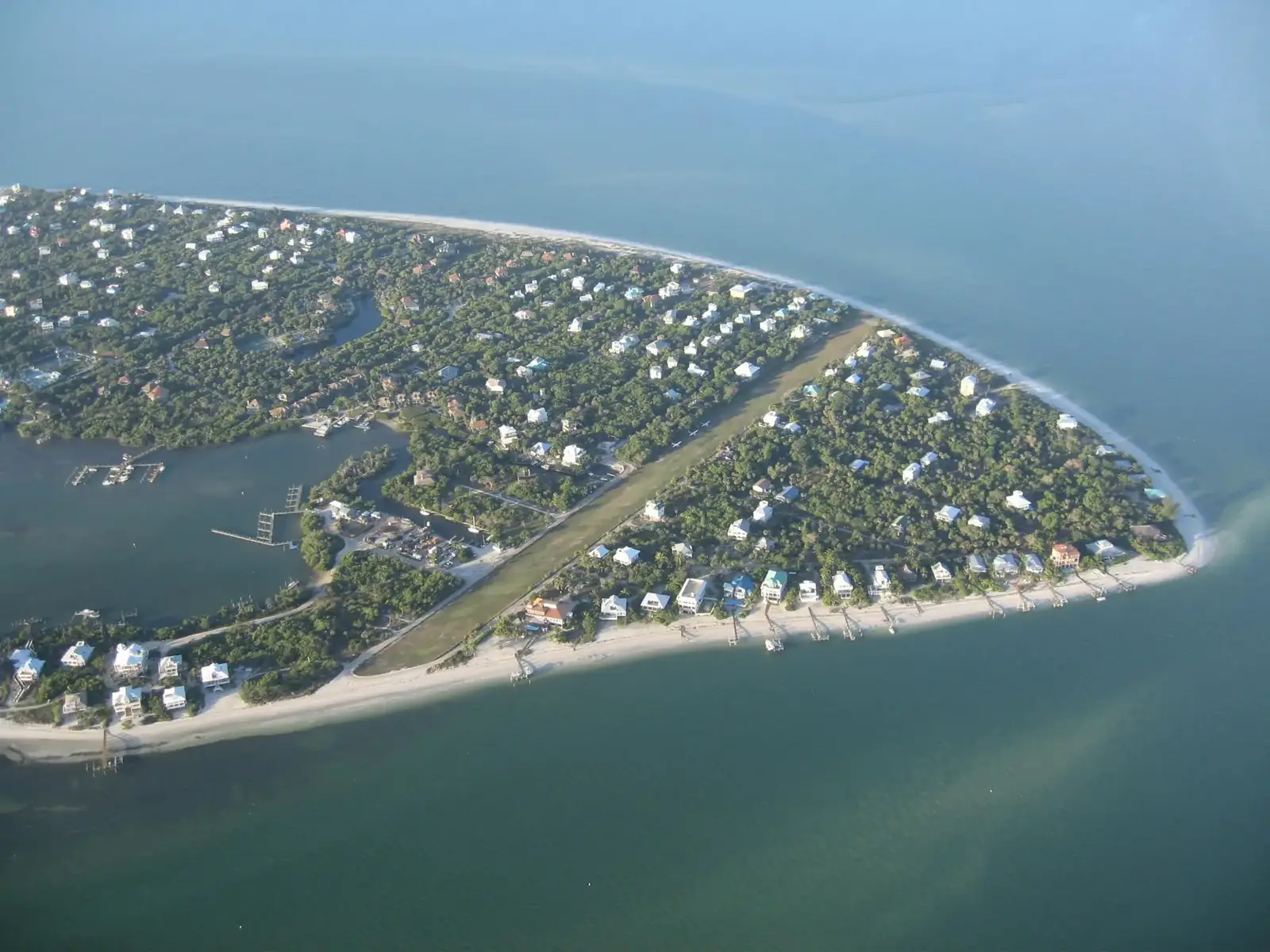 Aerial view of a long barrier island between the Gulf and the sound near Cape Coral, FL
