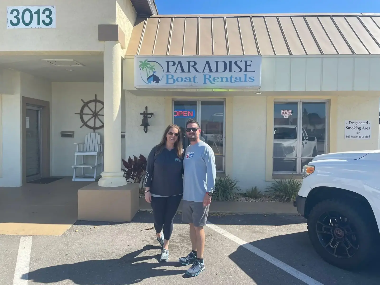 Paradise Boat Rentals team members outside our storefront in Cape Coral, FL