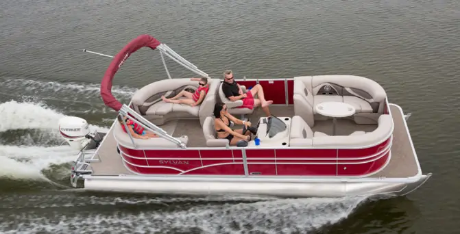 Red pontoon boat cruising with a group aboard for rent in Cape Coral, FL