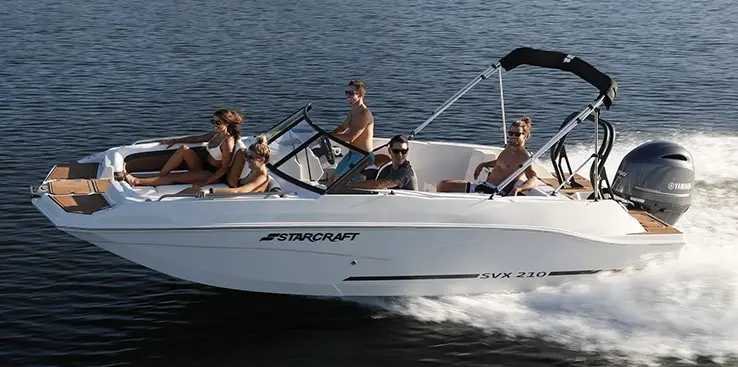 Starcraft deck boat cruising with friends aboard for rent in Cape Coral, FL