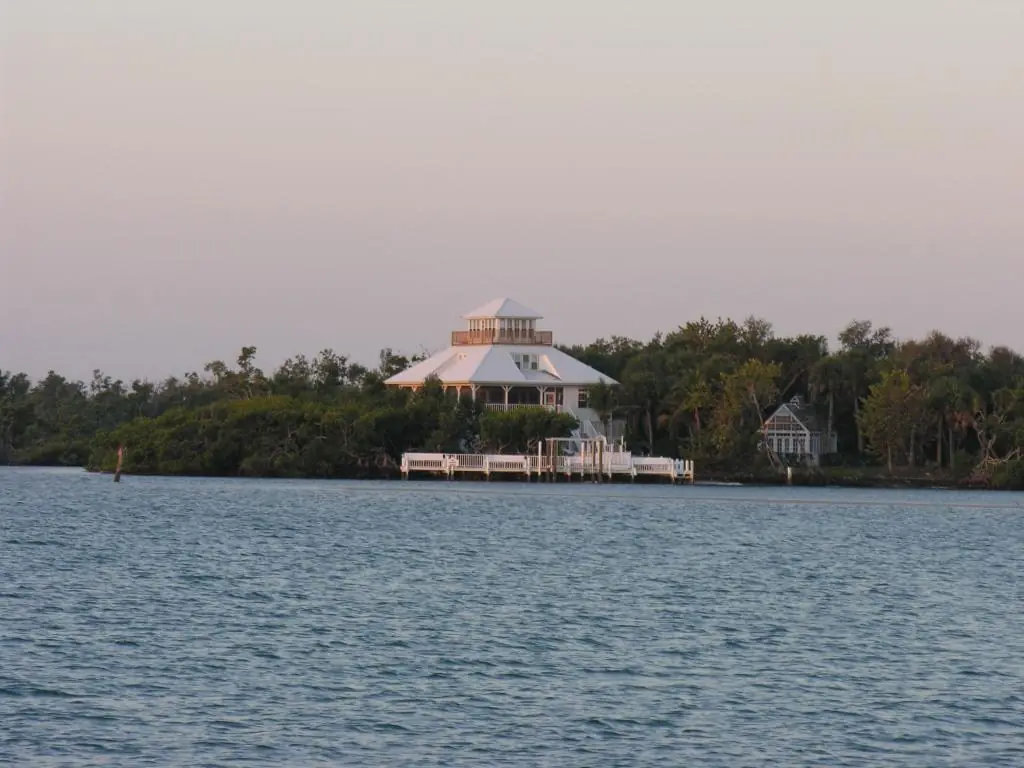 Stilt house on a mangrove shoreline at dusk near Cape Coral, FL